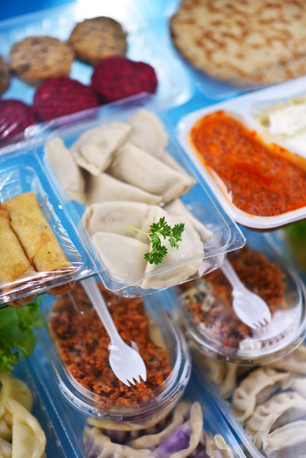 A Variety of Prepackaged Food Products in Plastic Boxes Stock Photo