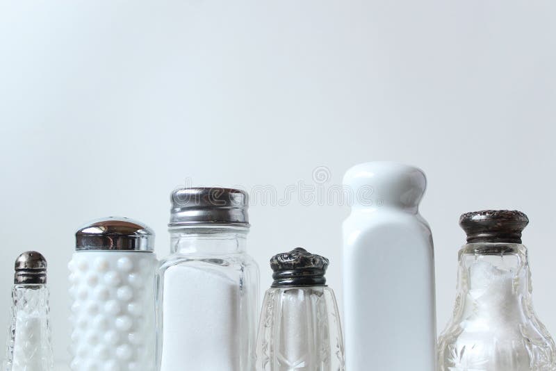 https://thumbs.dreamstime.com/b/variety-salt-shakers-filled-salt-both-modern-vintage-salt-salt-more-salt-124978721.jpg