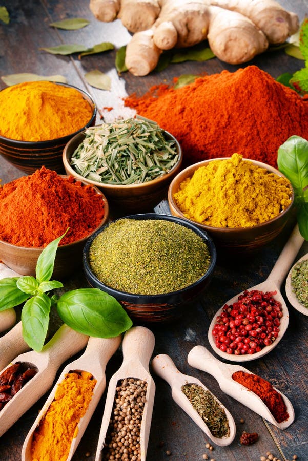 Variety of Spices and Herbs on Kitchen Table Stock Image Image of