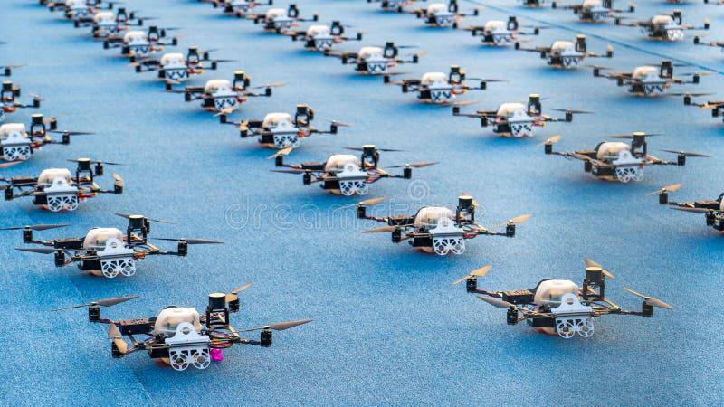 doha, qatar- december 12,2023 : multiple drones lined up for a drone show. doha, qatar- december 12,2023 : multiple drones lined up for a drone show