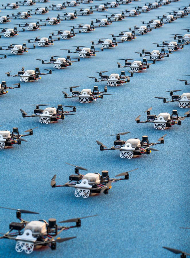 doha, qatar- december 12,2023 : multiple drones lined up for a drone show. doha, qatar- december 12,2023 : multiple drones lined up for a drone show