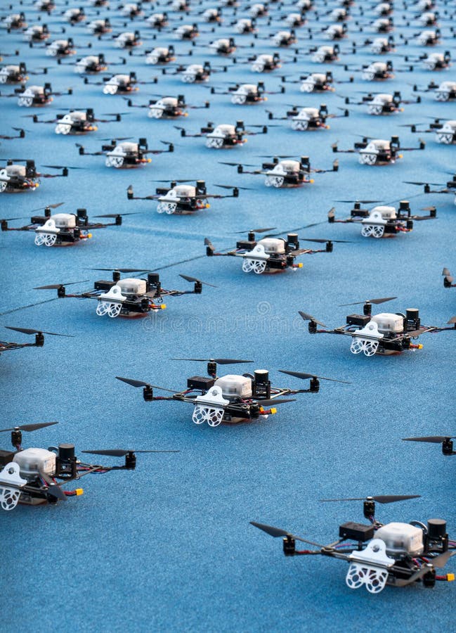 doha, qatar- december 12,2023 : multiple drones lined up for a drone show. doha, qatar- december 12,2023 : multiple drones lined up for a drone show