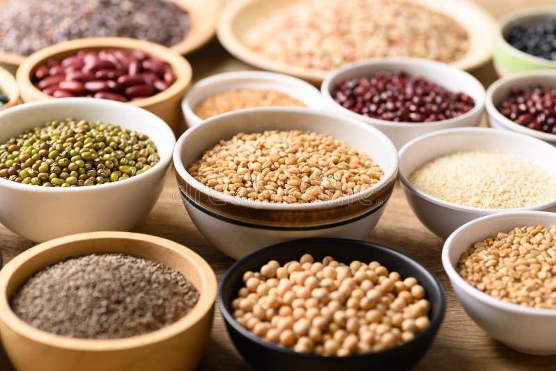 Various Cereal, Grain, Bean, Legume and Seed in Bowl Stock Photo