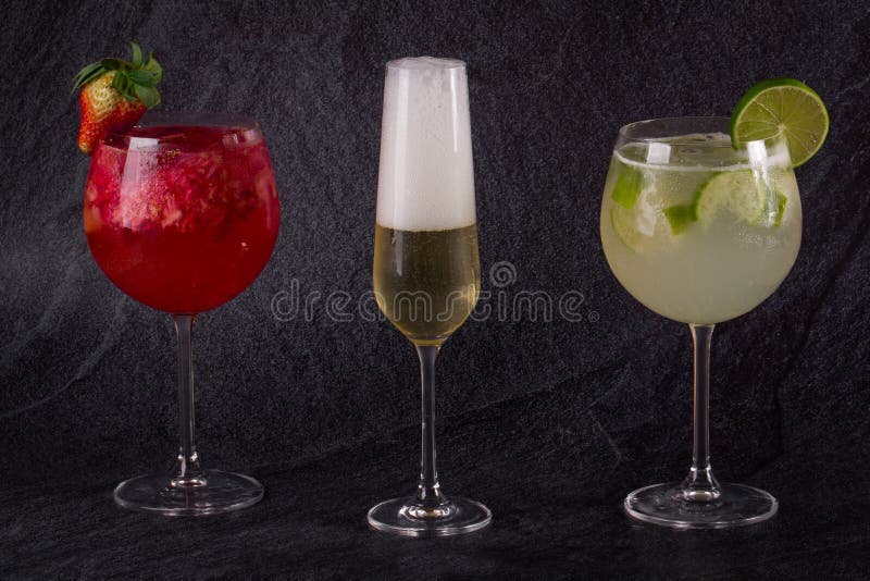 Various Cocktails. Gin Cocktails with Fruit and a Glass of Champagne