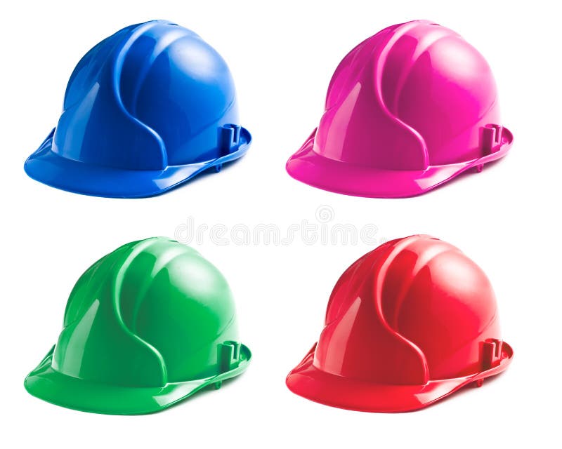 Various colors of hard hats stock image