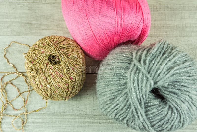 Various Colors Wool Balls in a Wooden Box with Knitting Needles Stock