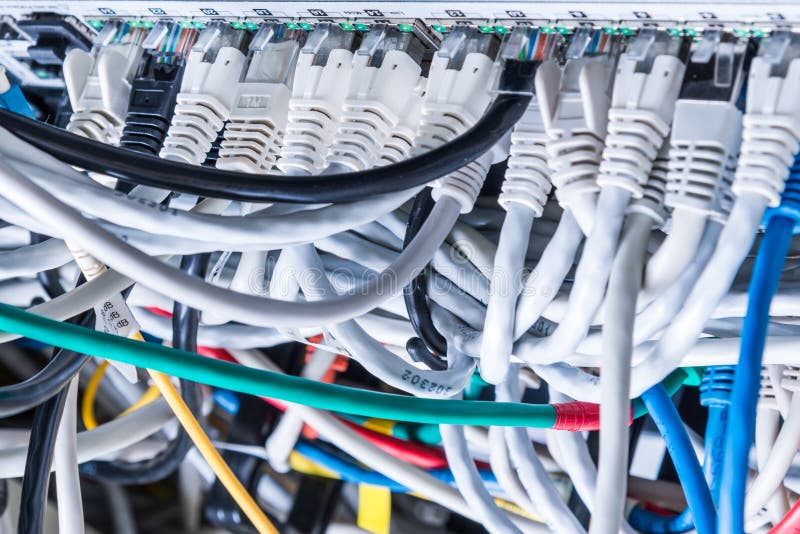 Patch cables connected to data router royalty free stock image