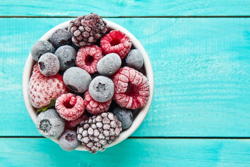 Bowl of frozen berries. Frozen berries