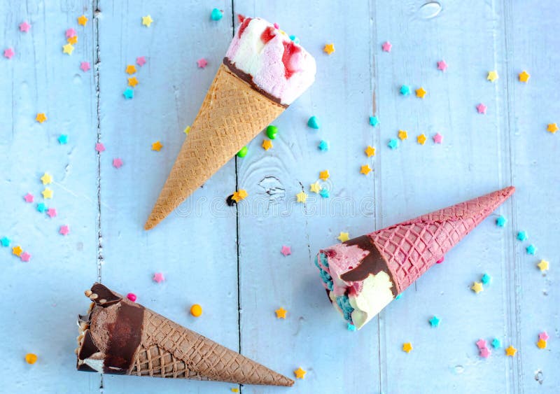 Various Ice Cream Flavours in Ice Cream Cones. Stock Photo Image of