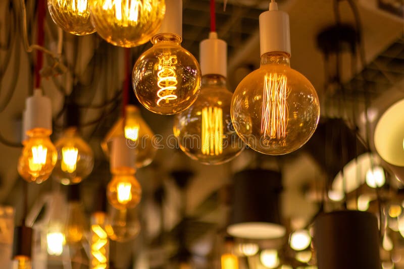 Various incandescent lamps in a store. Energy saving concept royalty free stock photography