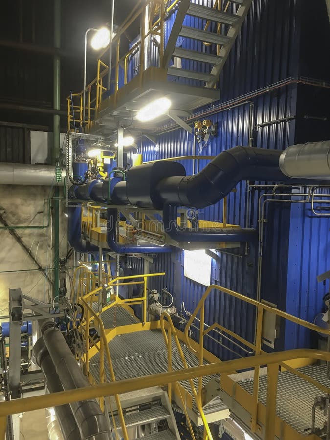 Various Installations Mounted Around the Coal Boiler Stock Image