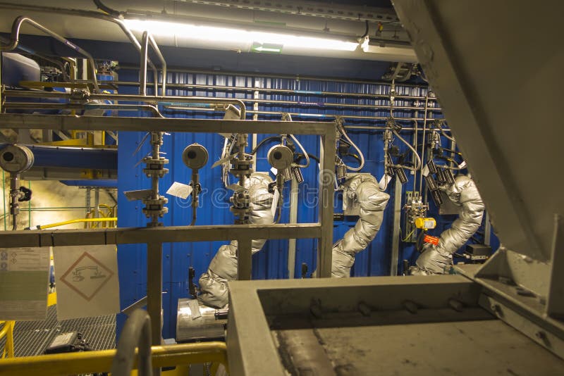 Various Installations Mounted Around the Coal Boiler Stock Photo