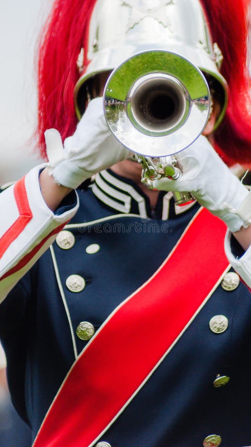 Close up and details of playing musicians, instruments in a marching, show band or music band. Close up and details of playing musicians, instruments in a marching, show band or music band