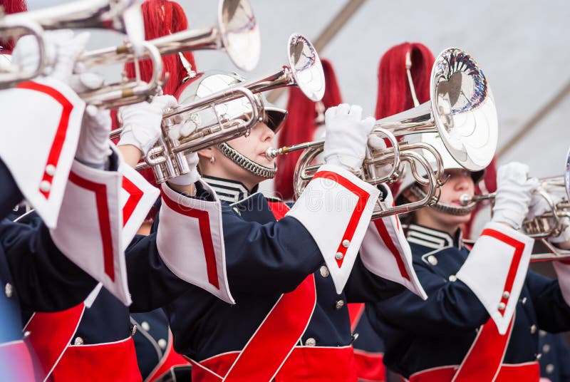 Close up and details of playing musicians, instruments in a marching, show band or music band. Close up and details of playing musicians, instruments in a marching, show band or music band