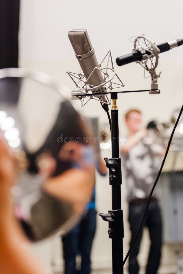 Sound recording in the studio with details or playing musicians, instruments in a marching, band or music show band. Sound recording in the studio with details or playing musicians, instruments in a marching, band or music show band