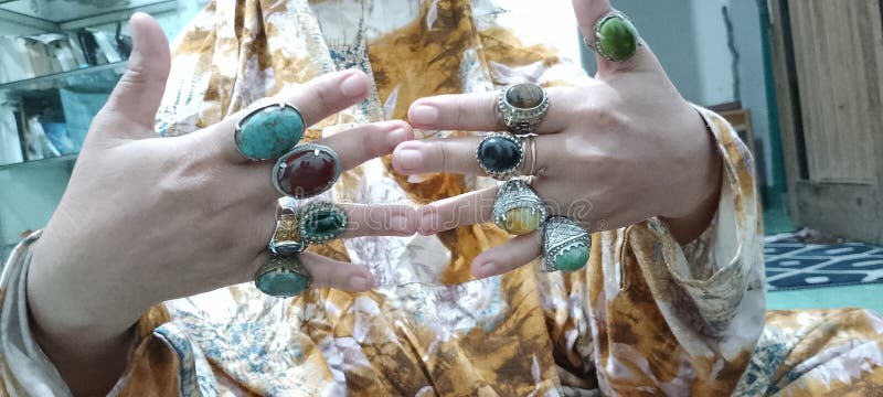 Various kinds of rings on the fingers stock image