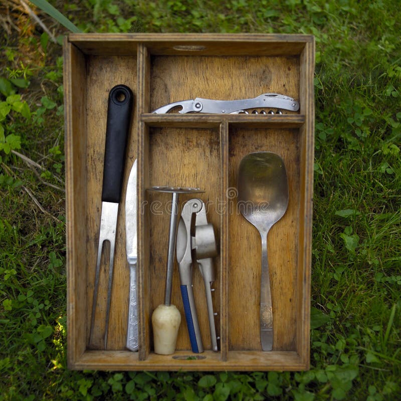 Kitchen utensils in a box stock image. Image of household 4906763