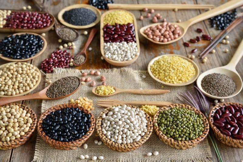 Multicolor dried bean in various scoop on the table. Multicolor dried bean in various scoop on the table