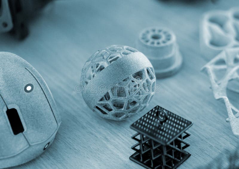 Various objects printed 3D printer molten plastic powder Different model printed royalty free stock photography