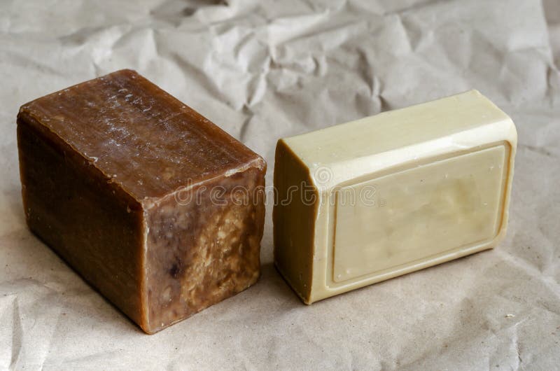 Various pieces of laundry soap on a plain background royalty free stock images