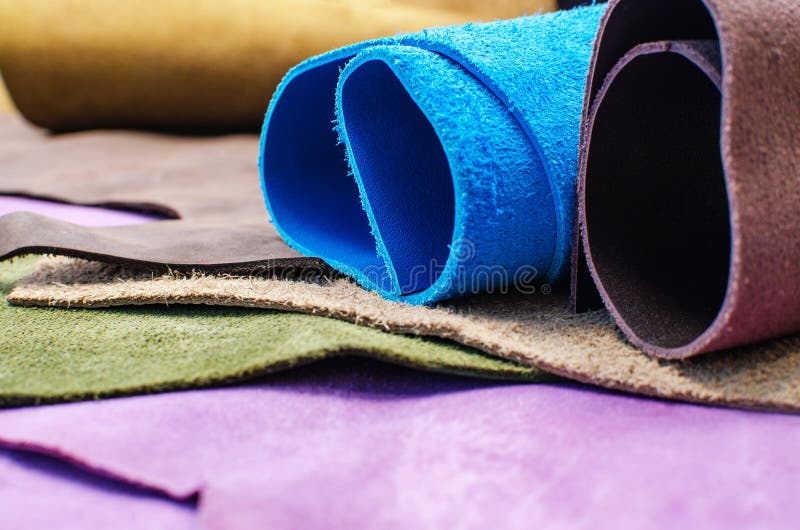 Various Pieces of Leather in Rolls. Pieces of Colored Leather. Stock Photo Image of pieces