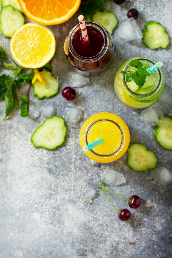 Various Refreshments Drinks Detox Cucumber Water, Cherry Juice and Orange Juice Stock Image