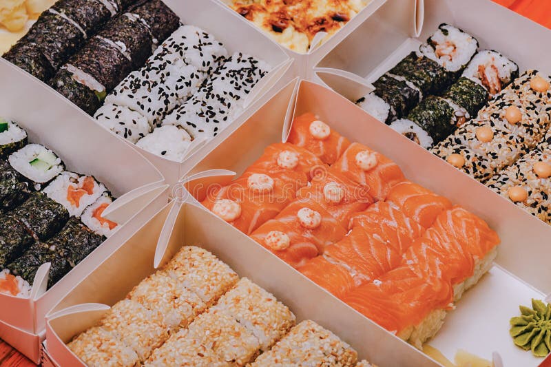 Various Rolls in Boxes. Food Delivery Japanese Cuisine Stock Photo