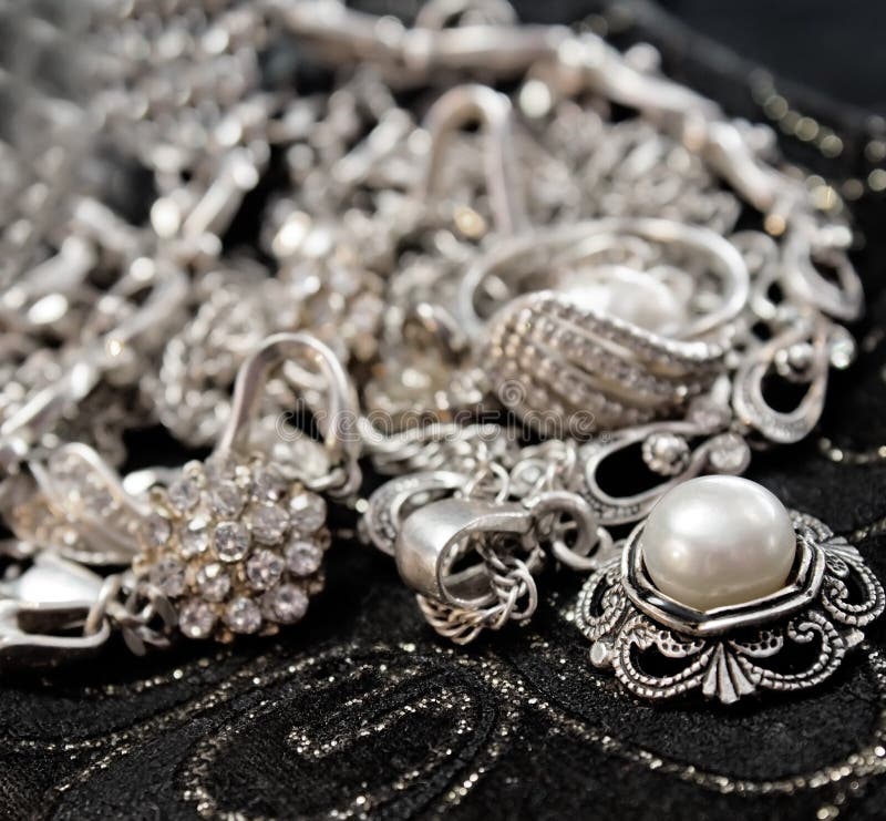 Various silver shining jewellery.