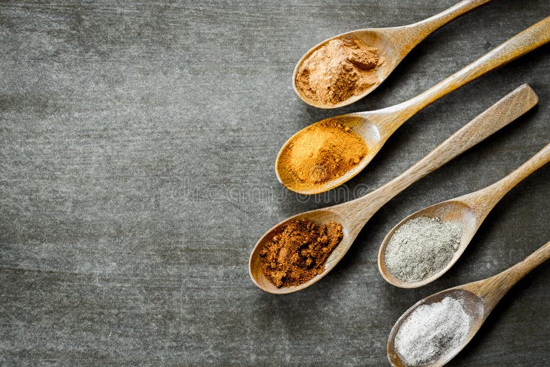Various Spices on Wooden Spoons Stock Photo Image of dark, ingredient