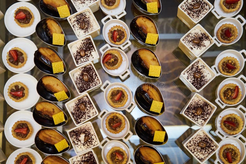 Various sweets snacks pudding yogurt souffle cookies stock photo