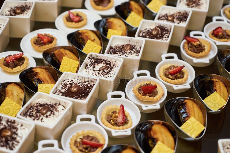 Various sweets snacks pudding yogurt souffle cookies royalty free stock photo