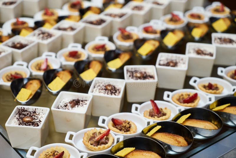 Various sweets snacks pudding yogurt souffle cookies stock images