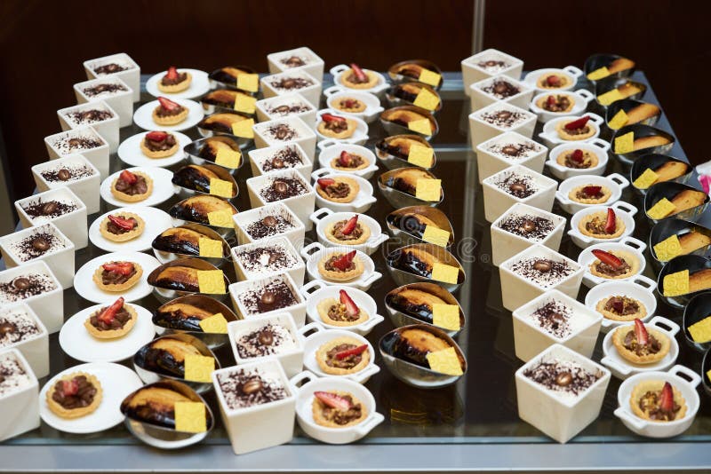 Various sweets snacks pudding yogurt souffle cookies stock image