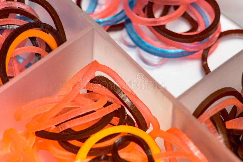 Various Thin Rubber Bands for Hair in a Plastic Box Stock Image - Image of hairstyling, object: 164711975 Various Thin Rubber Bands for Hair in a Plastic Box Stock Image - Image of hairstyling, object: 164711975