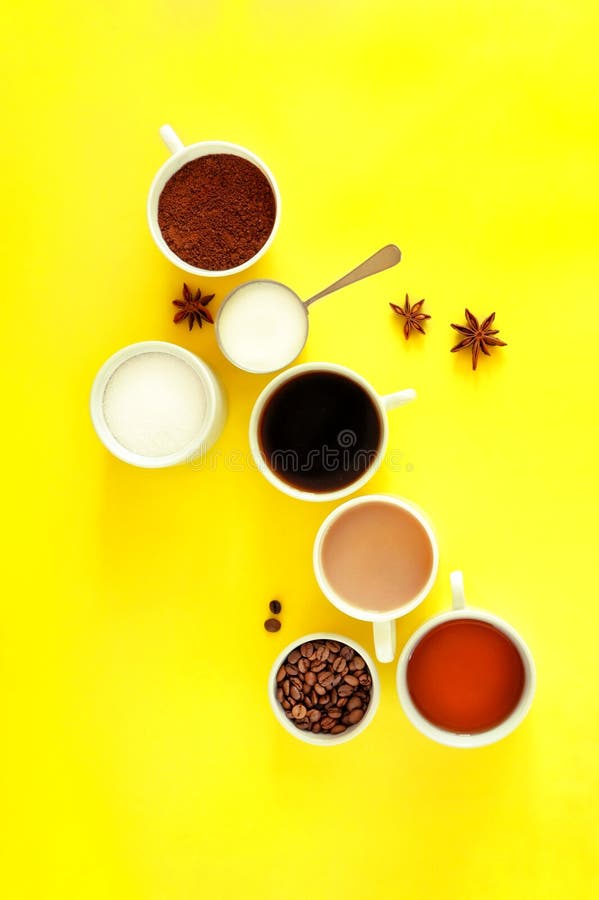 Various types ceramic white cups of coffee, tea with sugar, cream and star anise on a bright yellow background. stock photography Various types ceramic white cups of coffee, tea with sugar, cream and star anise on a bright yellow background. stock photography