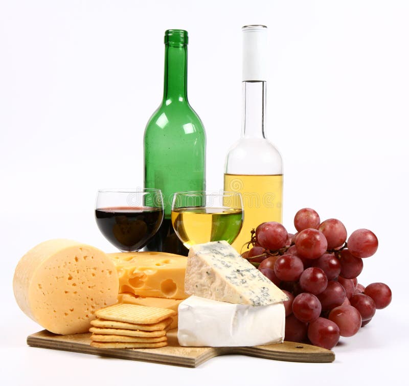 Various types of cheese, wine, grapes and crackers