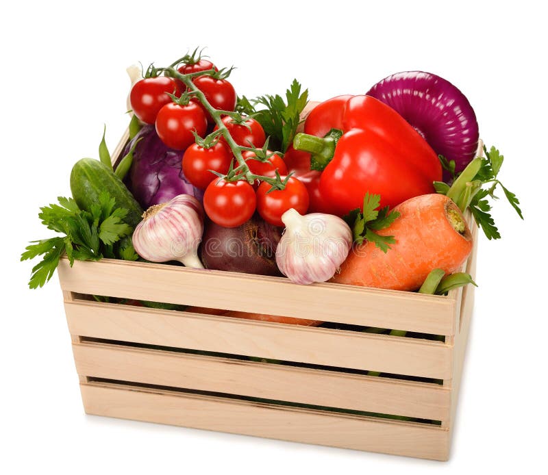 Various vegetables in a wooden box royalty free stock photo