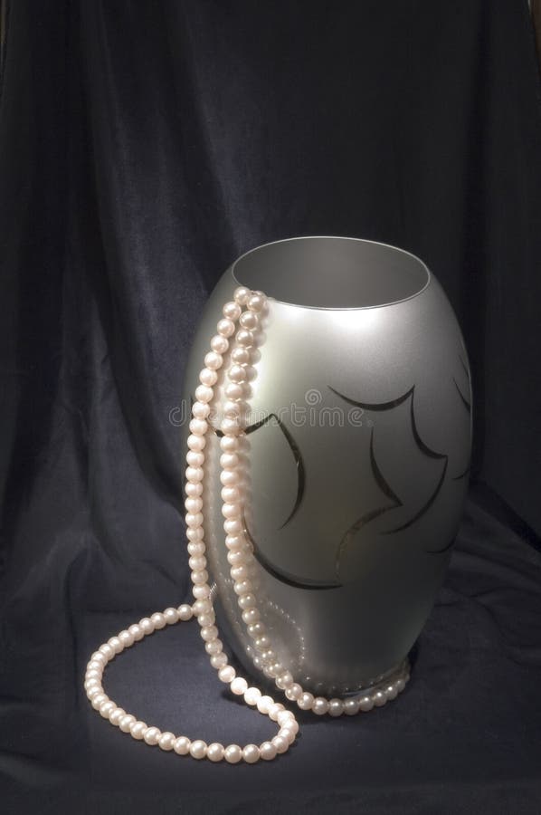 Vase with beads at black stock photo. Image of still, pearls 285570