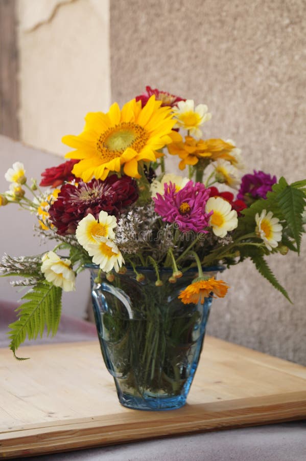 Vase with colored flowers stock photo. Image of perfume 96576898
