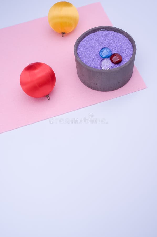 Vase with Colored Sand and Christmas Decorations with Copy Space Stock
