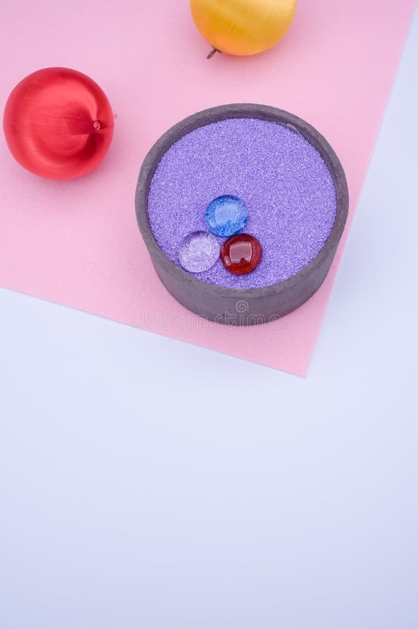 Vase with Colored Sand and Christmas Decorations with Copy Space Stock