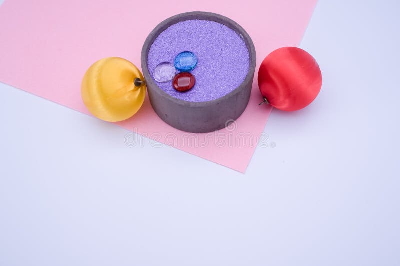 Vase with Colored Sand and Christmas Decorations with Copy Space Stock