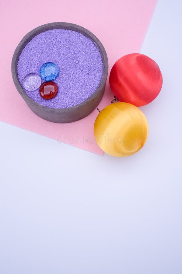 Vase with Colored Sand and Christmas Decorations with Copy Space Stock