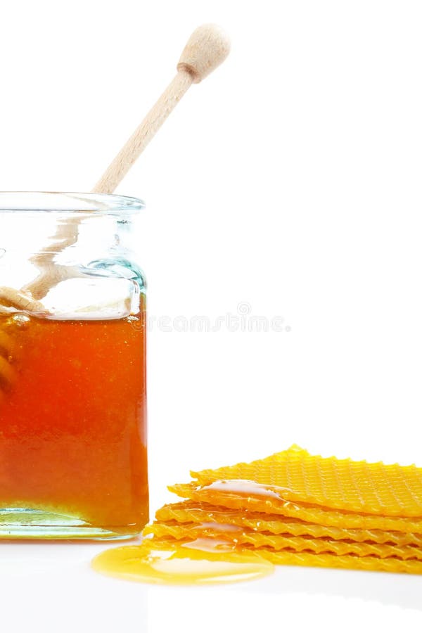 Vaso e favo del miele fotografie stock libere da diritti Vaso e favo del miele fotografie stock libere da diritti
