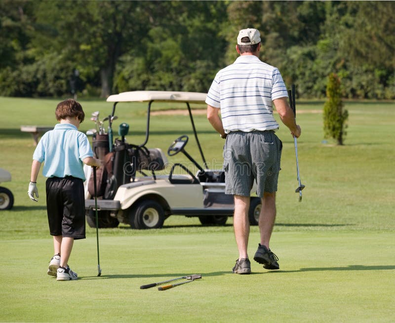 630 Kinder Die Golf Spielen Stock Fotos Freie & RoyaltyFree Stock