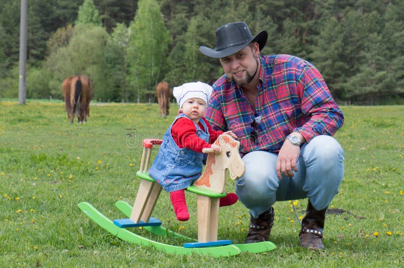 Vater- und Tochtercowboyart stockbild Vater- und Tochtercowboyart stockbild