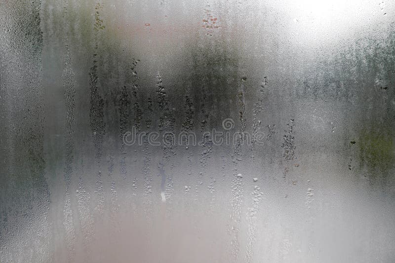 Vattendroppe på glass fönster