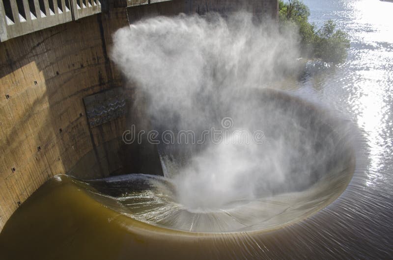 Water funnel after heavy rains in the San Roque dam. Water funnel after heavy rains in the San Roque dam