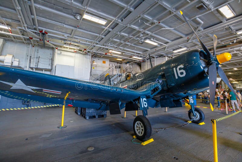 San Diego, California, United States - JULY 2018: Vought F4U Corsair American fighter aircraft of 1942 in USS Midway Battleship museum. American U. S. carrier fighter of Marine Corps of World War 2. San Diego, California, United States - JULY 2018: Vought F4U Corsair American fighter aircraft of 1942 in USS Midway Battleship museum. American U. S. carrier fighter of Marine Corps of World War 2.