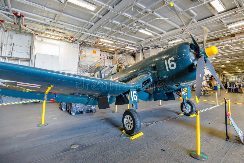 San Diego, California, United States - JULY 2018: Vought F4U Corsair American fighter aircraft of 1942 in USS Midway Battleship museum. American U. S. carrier fighter of Marine Corps of World War 2. San Diego, California, United States - JULY 2018: Vought F4U Corsair American fighter aircraft of 1942 in USS Midway Battleship museum. American U. S. carrier fighter of Marine Corps of World War 2.